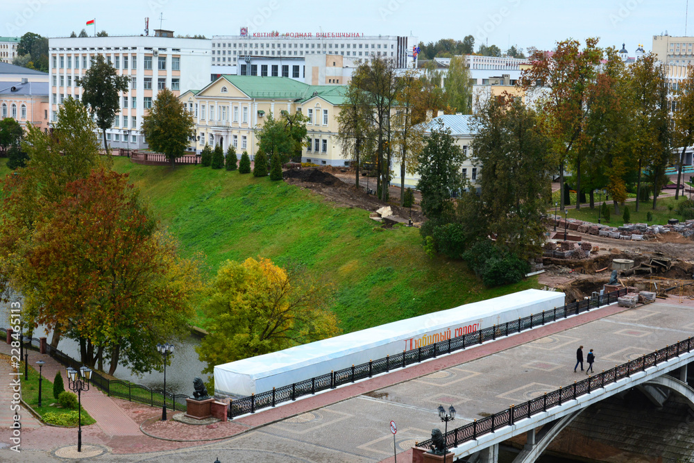 VITEBSK, BELARUS - JULY 21, 2015: Pushkin bridge near Holy Dormition Cathedral on the Uspenskaya mountain, Vitebsk, Belarus VITEBSK, BELARUS - JULY 21, 2015: Pushkin bridge near Holy Dormition Cathedral on the Uspenskaya mountain, Vitebsk, Belarus