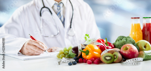 Schilderij op canvas Dietitian writing a prescription for healthy diet