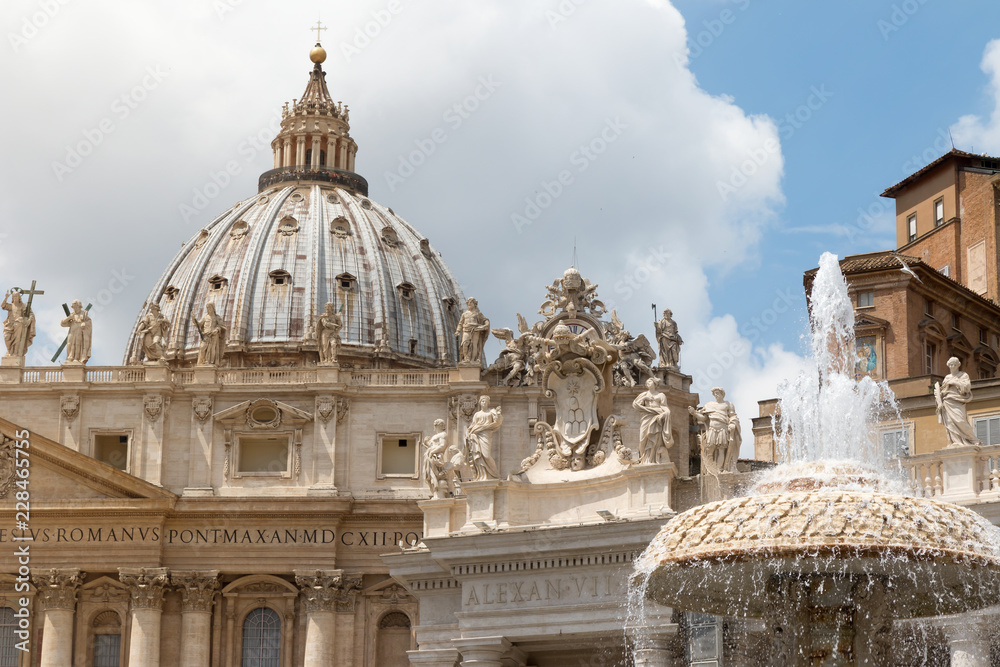 Closeup view of the fountain in front of St. Peter's Basilica on a St. Peter's Square in Vatican