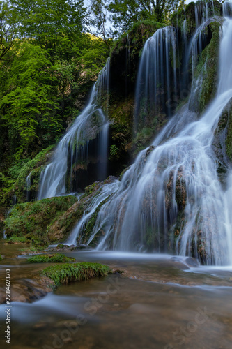 French landscape - Jura. Waterfall in the Jura mountains after heavy rain.