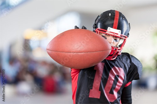 American football player with the ball isolated