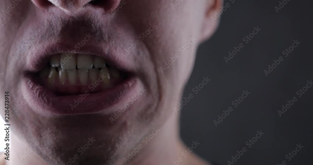 Close up mouth of Angry Man screaming. Danger Violence. 4K 10-bit Close up mouth of Angry Man screaming. Danger Violence. 4K 10-bit