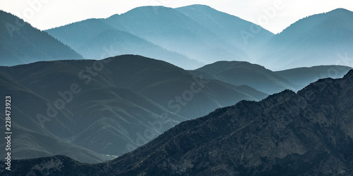 Fényképezés Vast mountain ridge in Ontario California in haze
