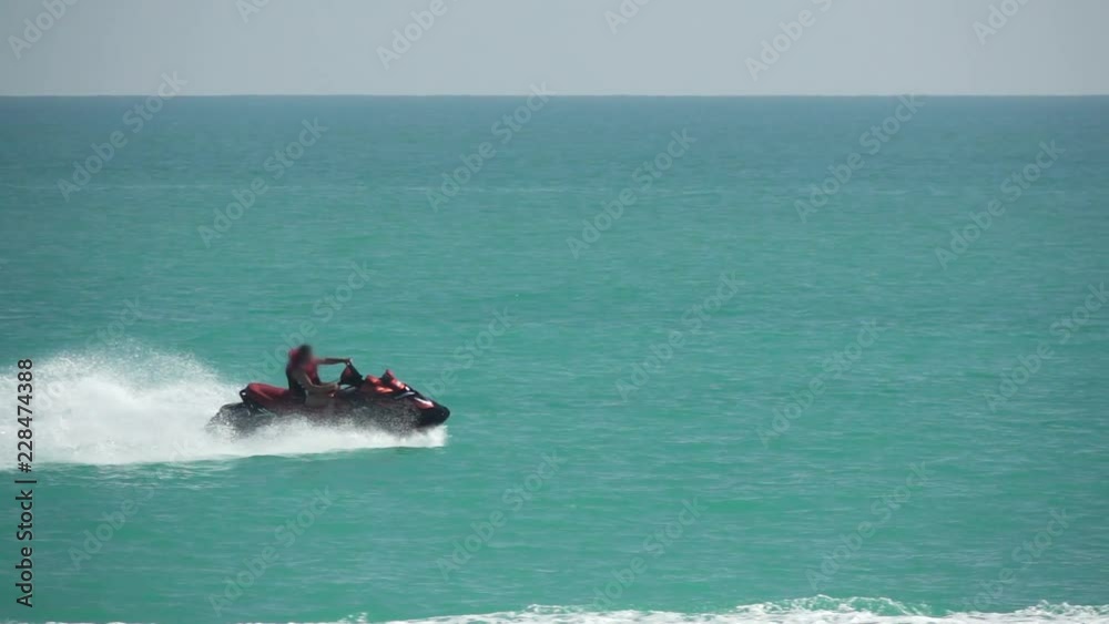 Man on jet sky in super slow motion