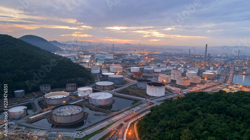 Aerial view gas storage sphere tanks in oil and gas refinery plant during sun rise morning time