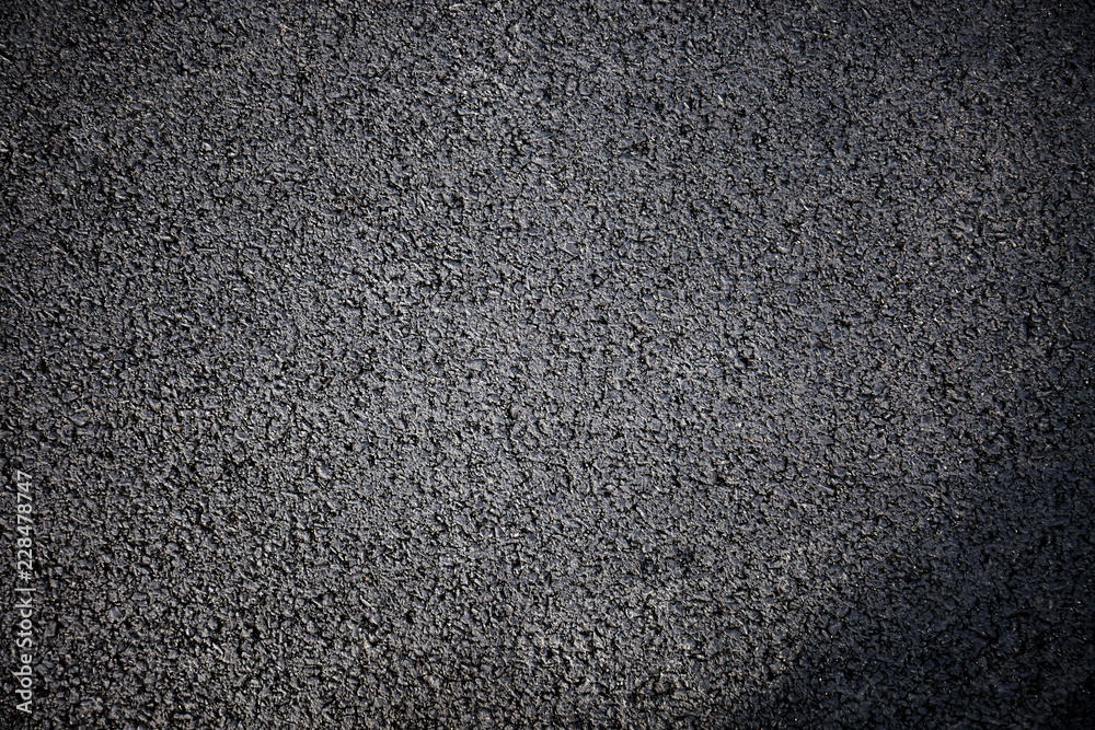 Obraz premium Black rough asphalt road texture background, Top view.
