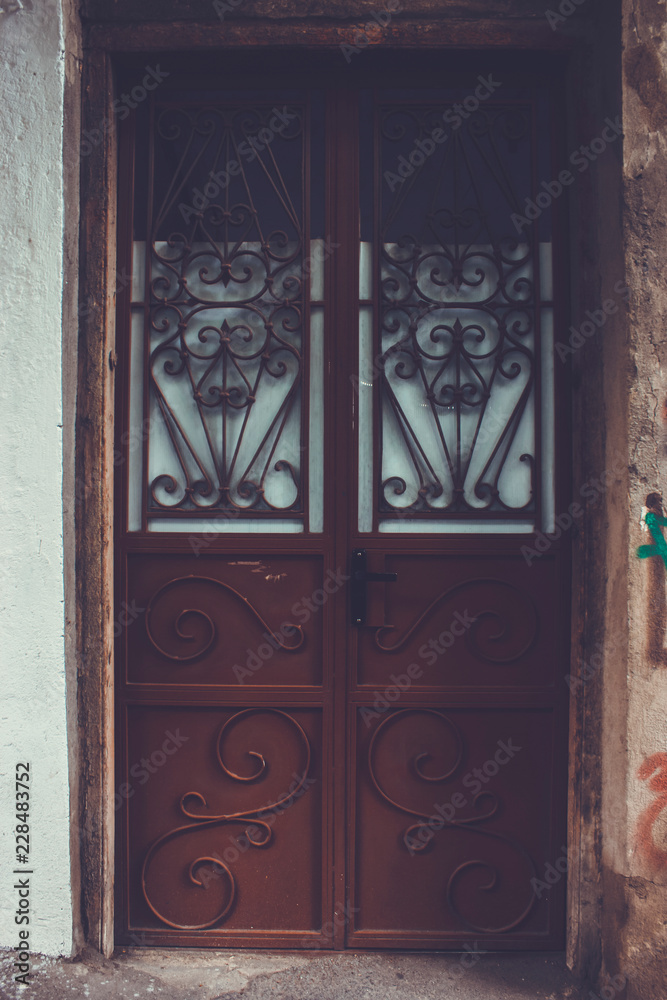 Old Tbilisi architecture,The entrance door and exterior decor in summer day Old Tbilisi architecture,The entrance door and exterior decor in summer day
