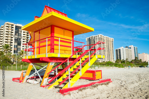 Brightly coloured orange,red and yellow lifeguard tower on South Beach in Miami, Florida
