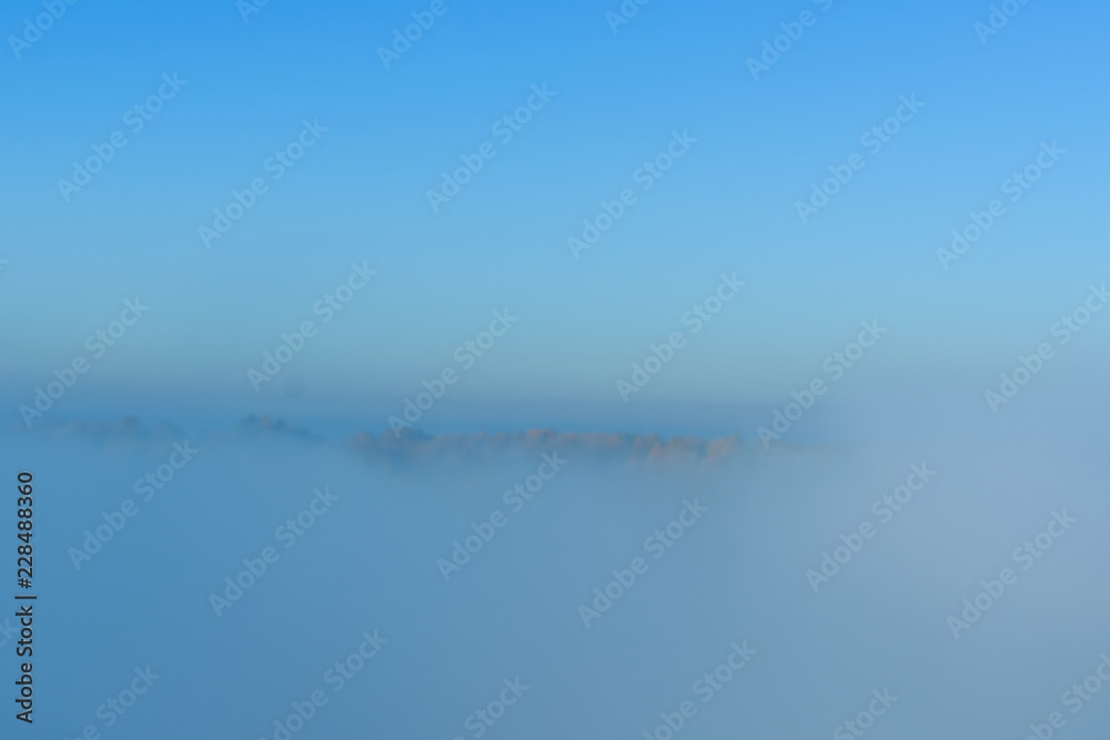 Naklejka premium Fog over the water on a river Dnieper on autumn