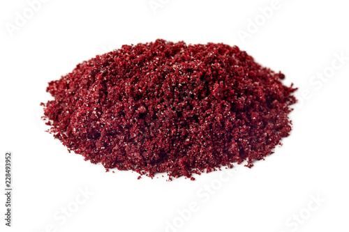 Fototapeta Naklejka Na Ścianę i Meble -  Ground sumac spice powder isolated on white background