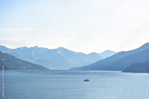 Lonely ferry cruising on Lake Como