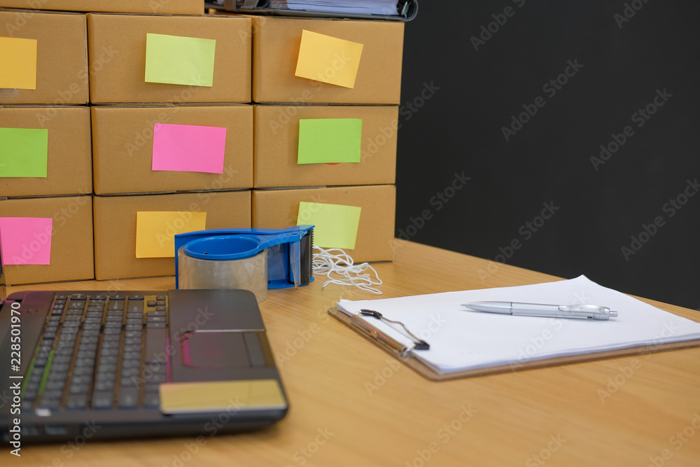 computer & parcel cardboard box. Online selling, e-commerce concept computer & parcel cardboard box. Online selling, e-commerce concept
