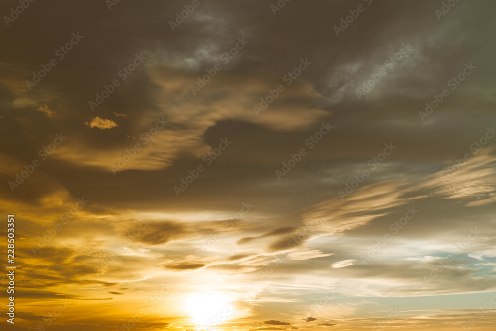 dramatic sky with clouds during sunset, background