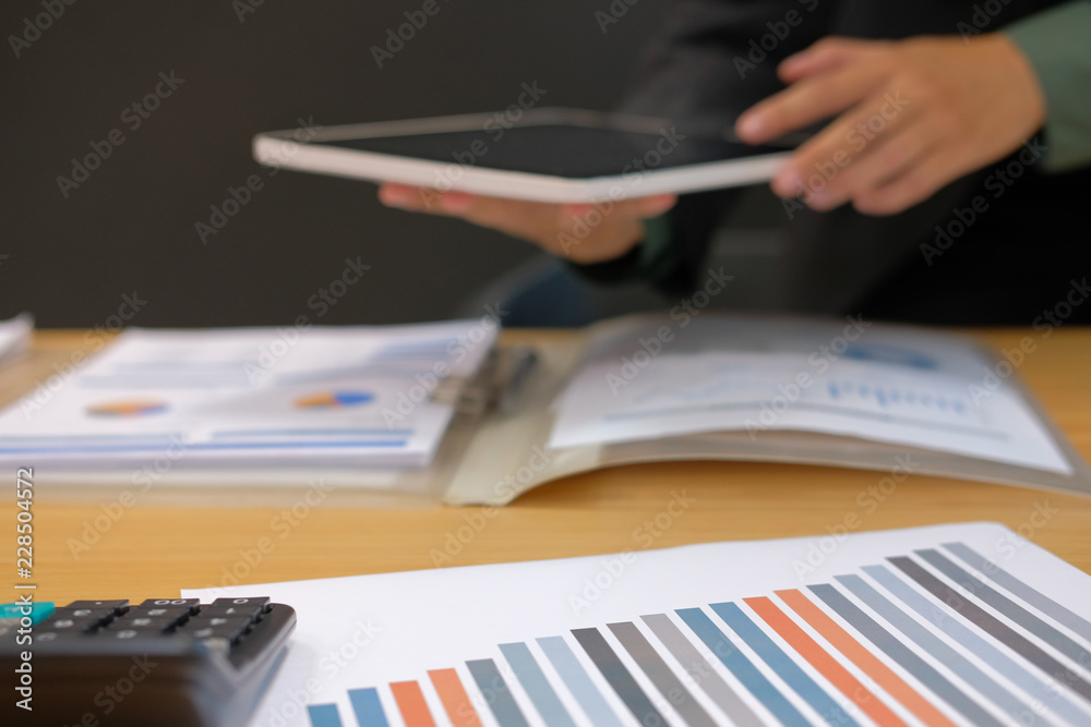 man organizing plan with tablet. businessman working at workplace man organizing plan with tablet. businessman working at workplace