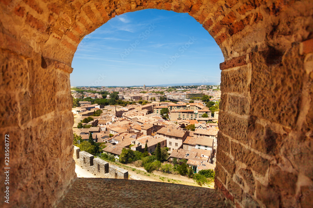 Overlooking Carcassonne through ancient window