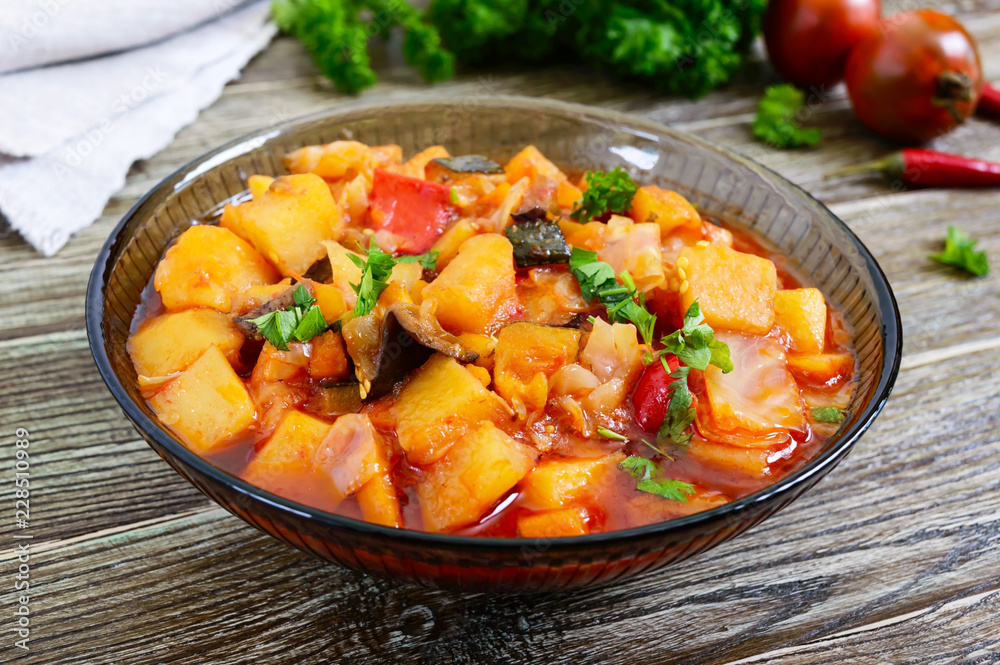 Delicious vegetable stew in a glass bowl. A popular dish of many countries of the world. Vegetarian menu