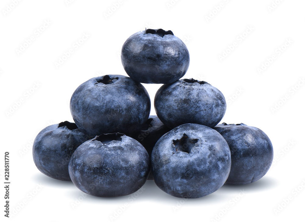 Blueberries with green leaves closeup, isolated on white background Blueberries with green leaves closeup, isolated on white background