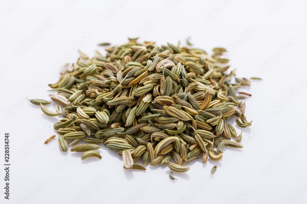 essential oil of fennel seeds on a white background essential oil of fennel seeds on a white background