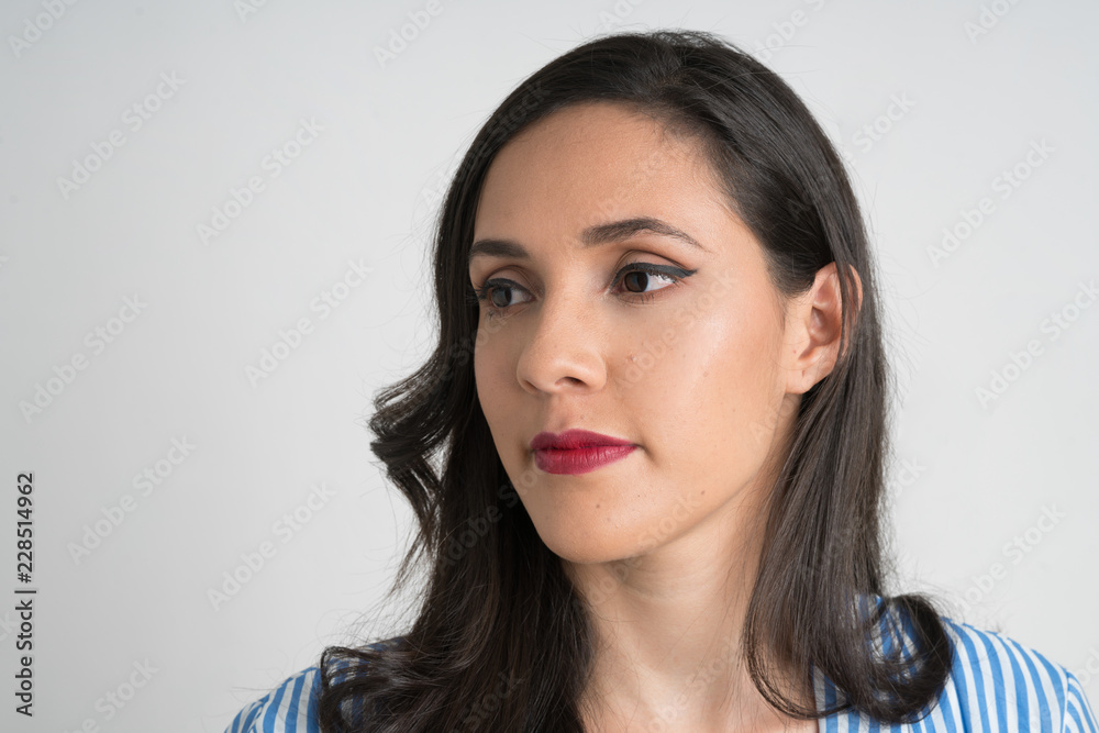 Woman portrait, face and looking left, with red lips