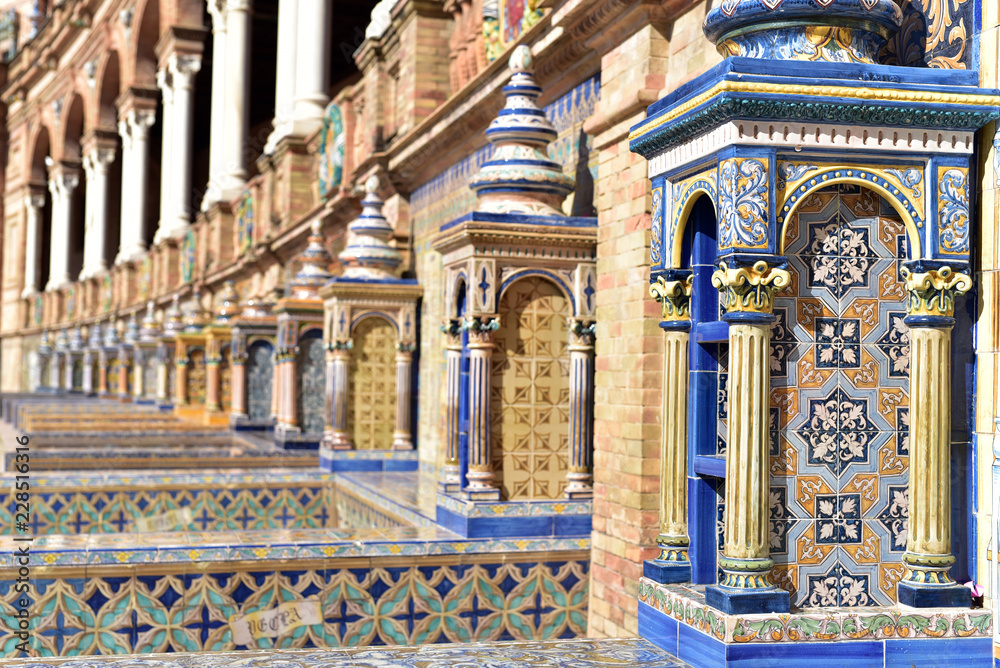 Ceramic tiles with colored ornaments on Plaza de Espana in Seville, Andalusia, Spain
