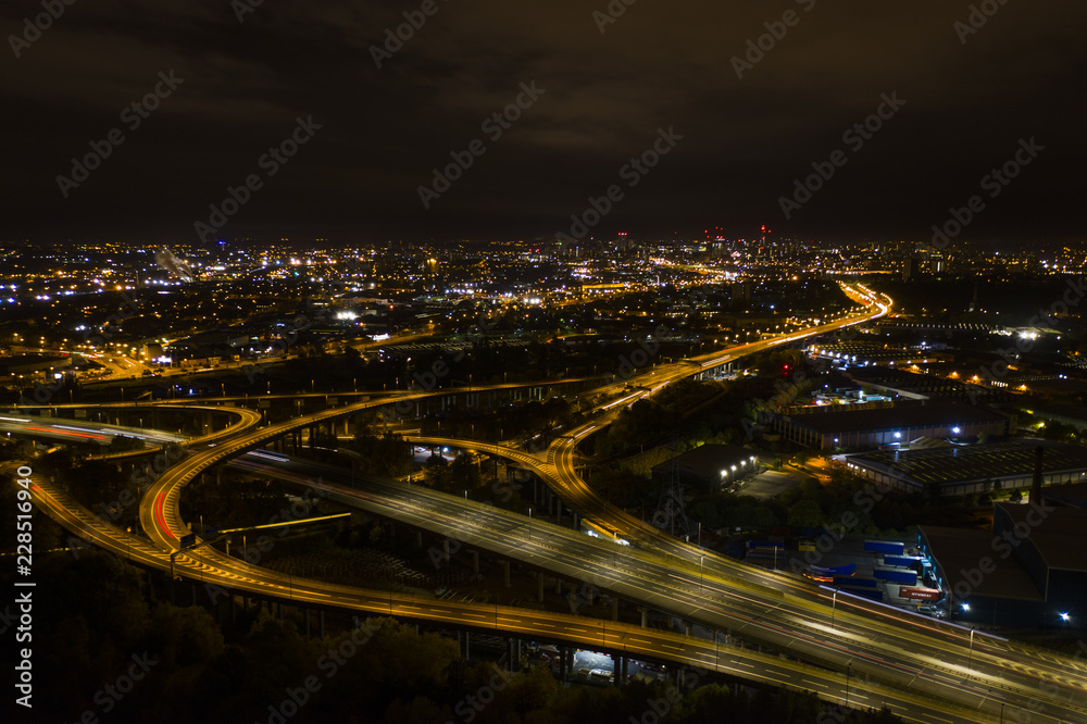 UK Motorway traffic night aerial shot.