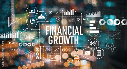 Financial growth with blurred city abstract lights background
