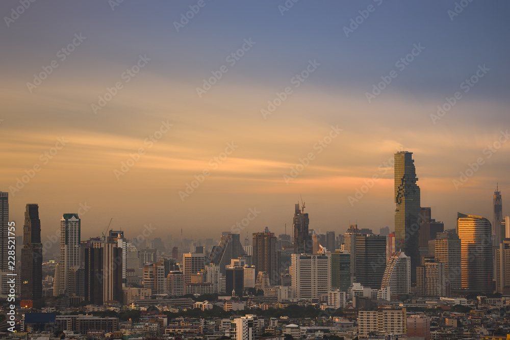 surreal sunset skyline with cityscape building layer