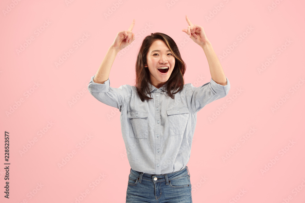 I won. Winning success happy woman celebrating being a winner. Dynamic image of caucasian female model on pink studio background. Victory, delight concept. Human facial emotions concept. Trendy colors I won. Winning success happy woman celebrating being a winner. Dynamic image of caucasian female model on pink studio background. Victory, delight concept. Human facial emotions concept. Trendy colors