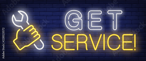 Get service neon text with hand holding wrench. Car service and repair advertisement design. Night bright neon sign, colorful billboard, light banner. Vector illustration in neon style.