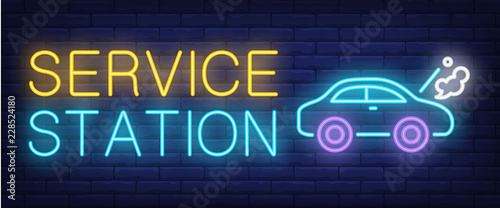 Service station neon text and car with smoking engine. Car service and repair advertisement design. Night bright neon sign, colorful billboard, light banner. Vector illustration in neon style.