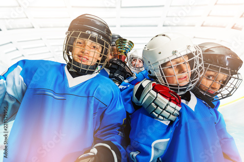 Photography Children's ice hockey team celebrating victory