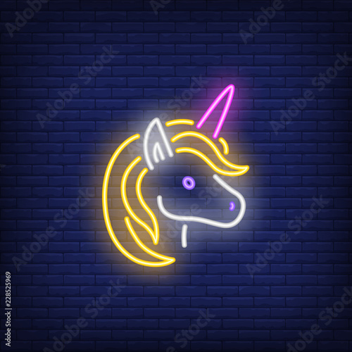 Unicorn neon sign. Glowing neon unicorn on dark blue brick background. Vector illustration can be used for party, festivals, fairy-tales