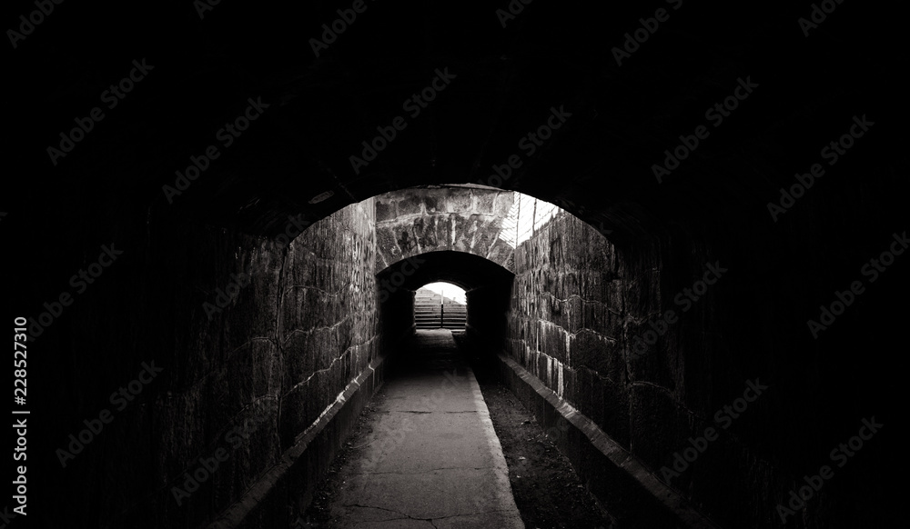 Old creepy underground stone tunnel. Halloween Locations