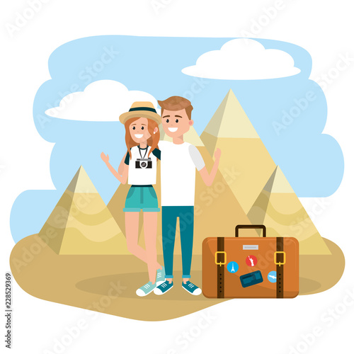 woman and man couple with briefcase and pyramids of giza