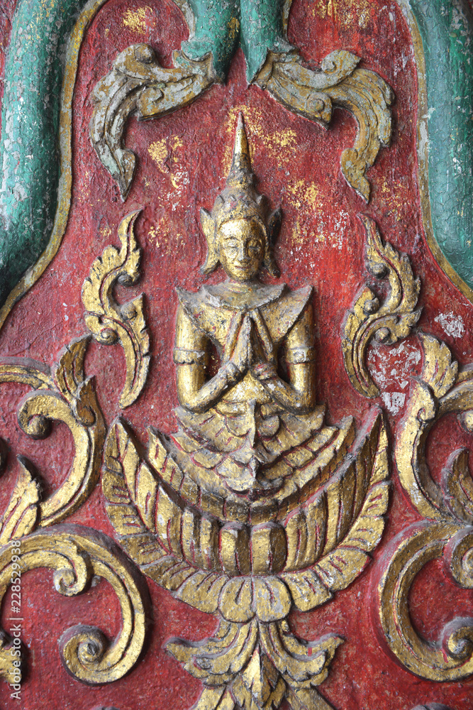 Native Thai style carving decorated at the temple in Thailand