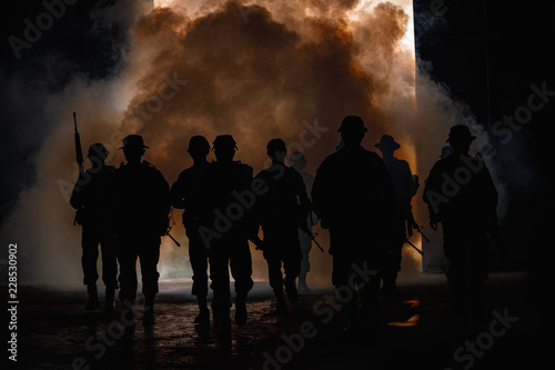 soldiers walkers carry weapon of fire © SHUTTER DIN