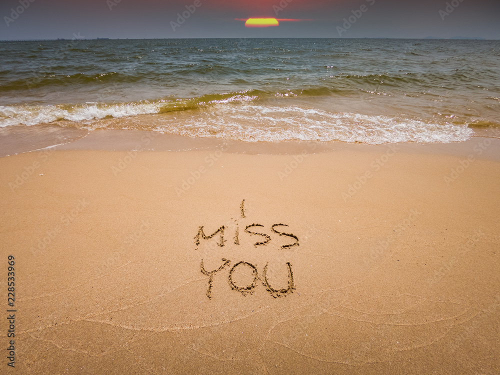 Foto Stock Font hand writing on sand of i miss you on the beach | Adobe  Stock