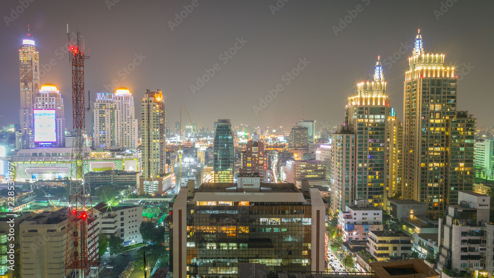 Beautiful cityscape of office building in the night at Bangkok , Thailand.