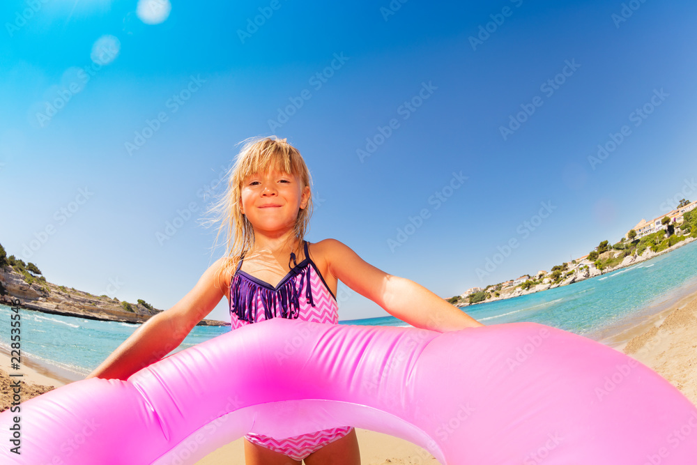 Adorable little girl ready for sea swimming Stock Photo | Adobe Stock