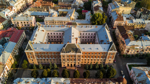 Chernivtsi city from above Western Ukraine. Regional Council building of Chernivtsi on sunset top view. photo