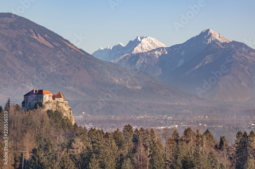 Castle Bled with snowy mountain Begunjscica in Karavanke in background, Slovenia