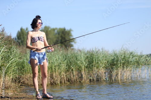 girl with fishing rod