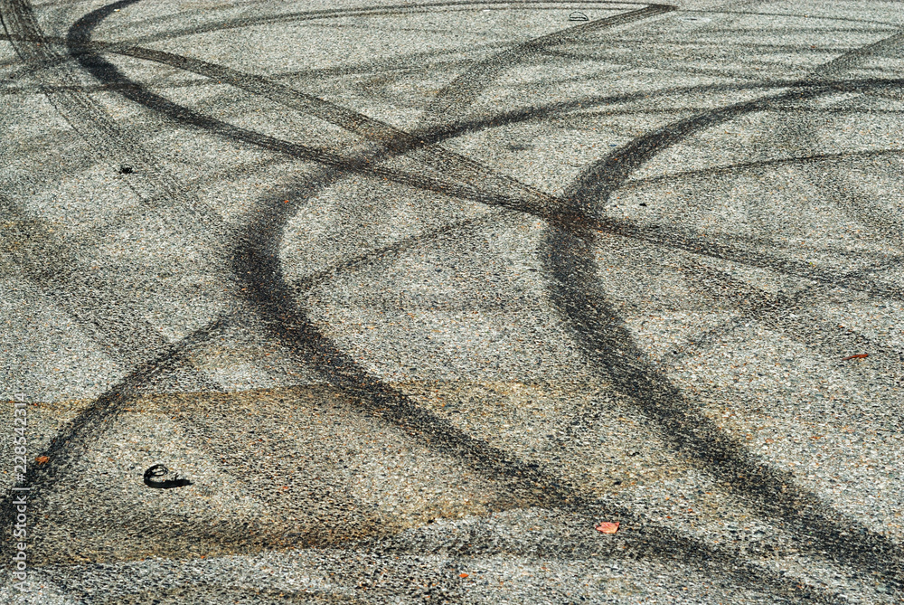 Skid marks and burnouts on the pavement. Stock Photo | Adobe Stock