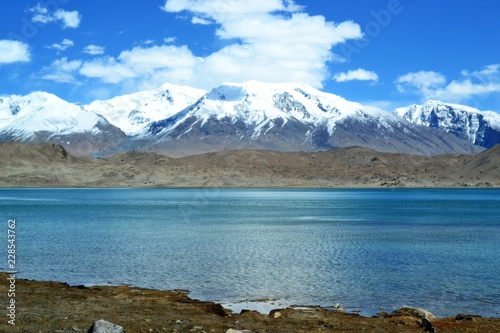 Karakul lake and pamir mountains in Xinjiang, Karakorum highway, China