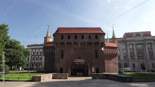 Time-lapse of historical part of medieval city defense - barbakan in Krakow , Poland  photo