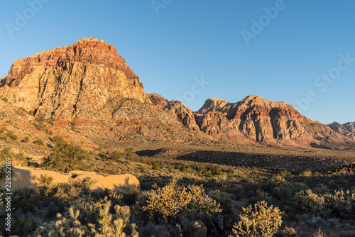 Morning light on Mt Wilson and Rainbow Mountain at Red Rock Canyon National Conservation Area. A popular natural area 20 miles from Las Vegas, Nevada. 