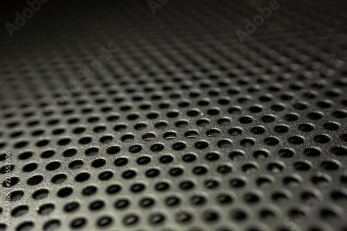A metal plate with small holes