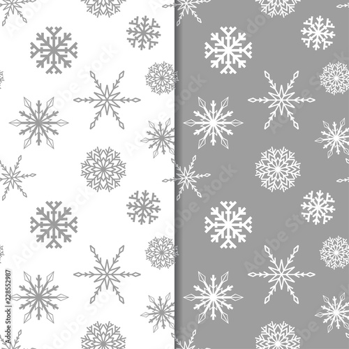 Snowflakes. Seamless patterns. Gray and white winter ornaments