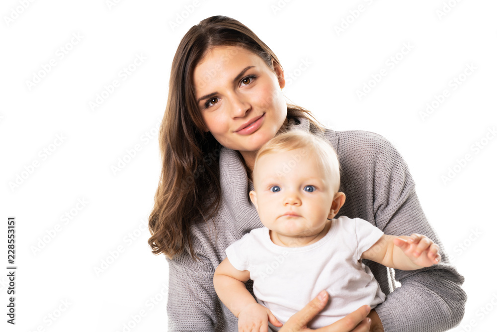 A mother holdng his baby on studio white background