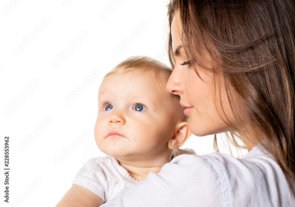 A mother holdng his baby on studio white background A mother holdng his baby on studio white background